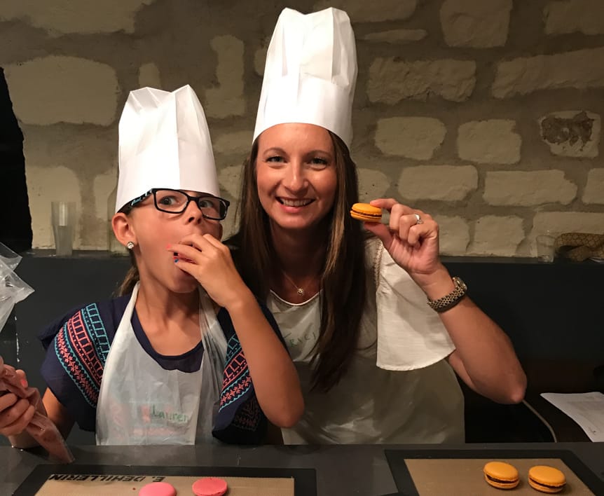 Two kids taking cooking lessons